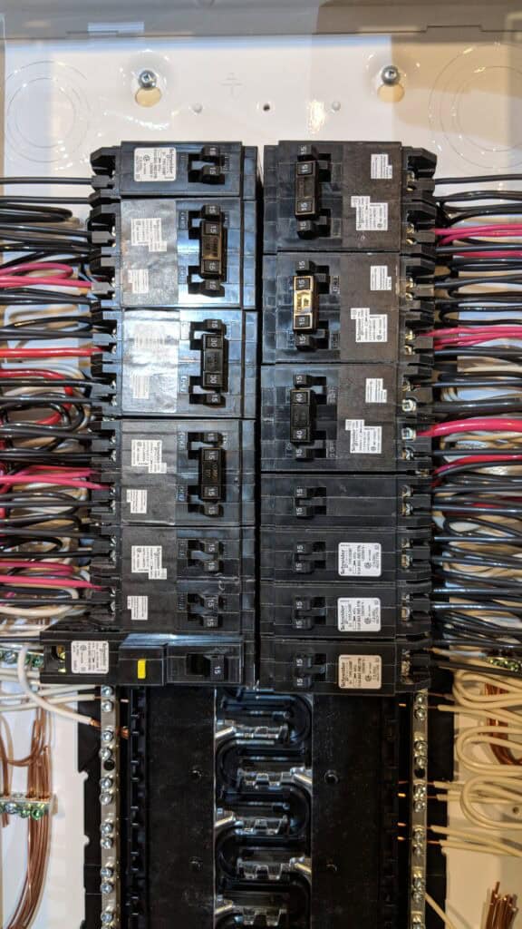 100 amp panel replacement step by step close up on breakers
