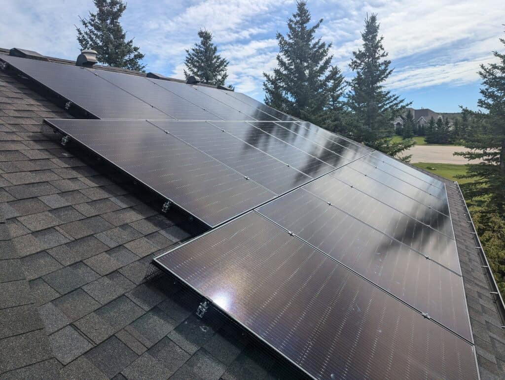 solar pv installation springbank calgary array-with trees in background