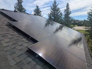 solar pv installation springbank calgary array-with trees in background