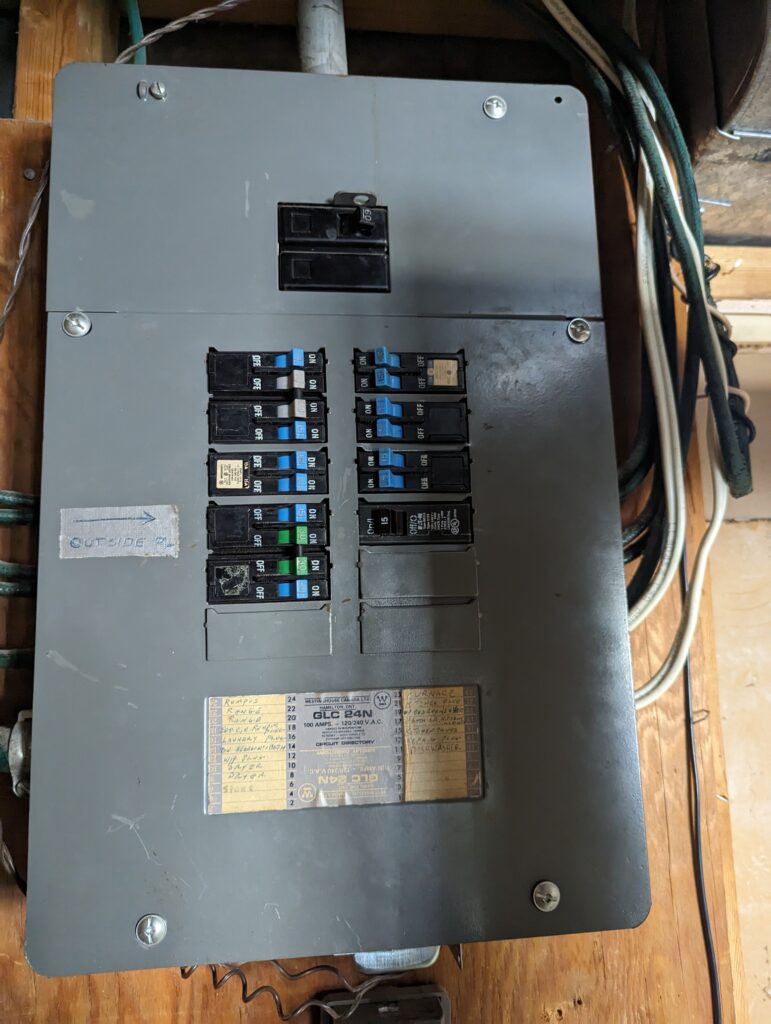 Before picture of a 60 amp to 100 amp panel upgrade in Bowness, Calgary