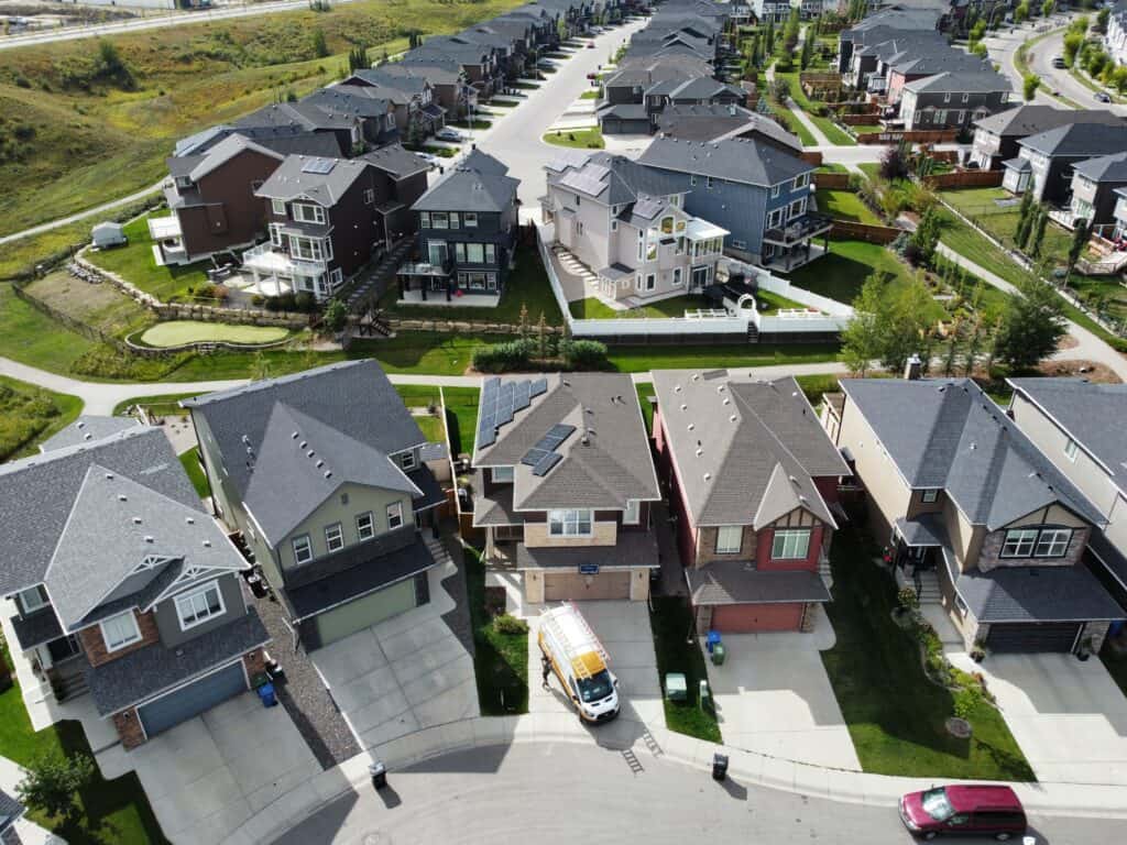 Solar panel installation underway on a Calgary residential roof