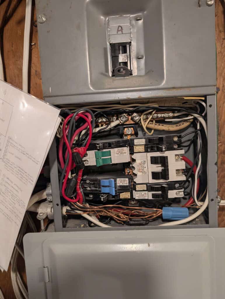 Licensed Calgary electrician replacing a Stab-Lok electrical panel